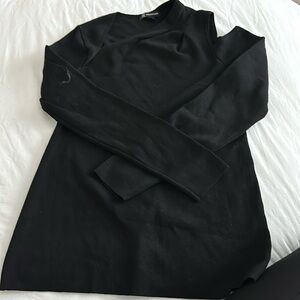 INC black sweater with open left arm detail.  Size Large.